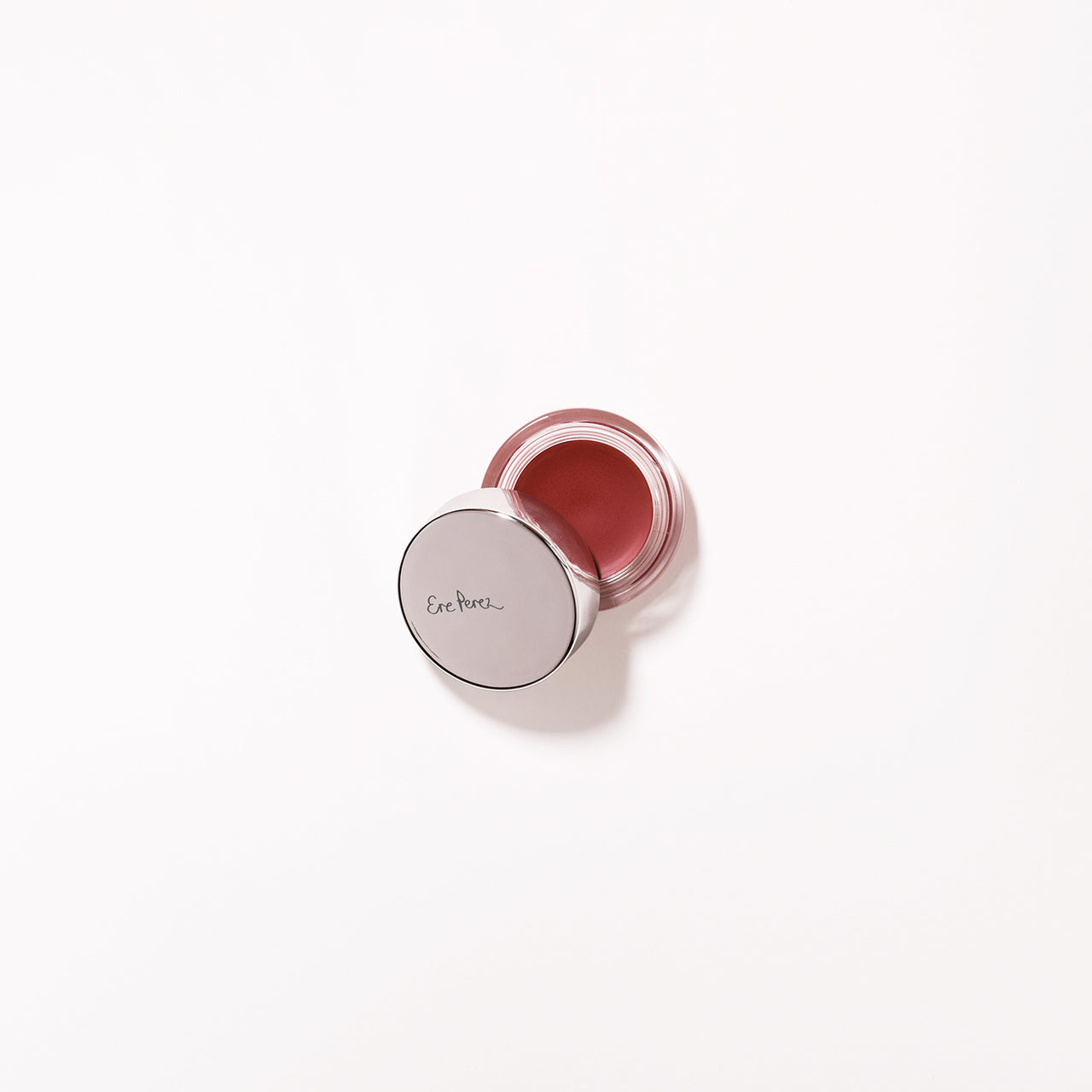 envase de vidrio sostenible de balsamo de zanahoria ere perez tono happy fondo blanco