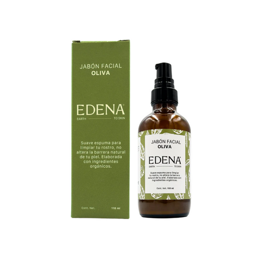 vista frontal de envase de vidrio color ambar del jabon facial de oliva junto con empaque de edena en fondo blanco