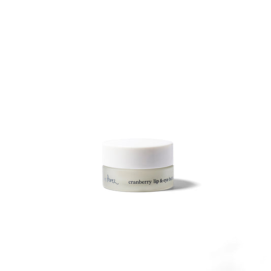 Crema con arando para ojos y labios frasco de vidrio Ere Perez vista de frente con fondo blanco disponible en BLUMMA
