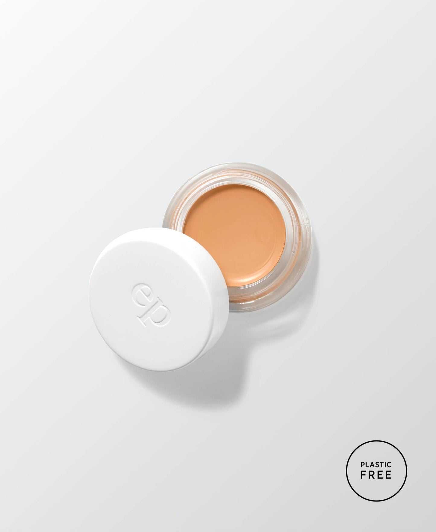 envase sostenible de vidrio mostrando el producto base corrector de arnica en tono caramel ere perez fondo blanco disponible en bluma 