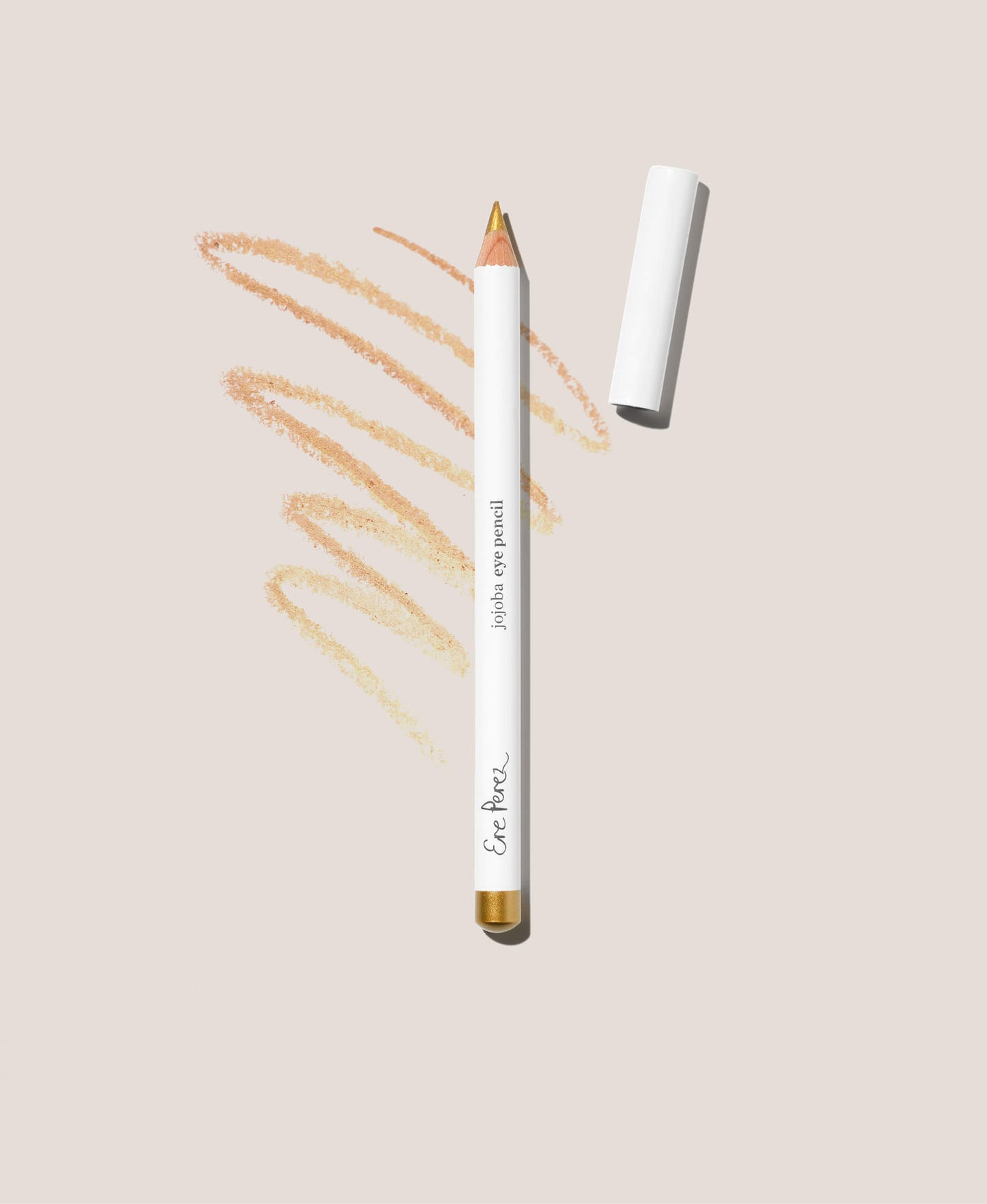 vista frontal lapiz delineador de ojos tono oro con jojoba ere perez con fondo blanco