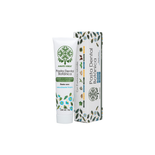 vista frontal del envase de plastico blanco de la pasta dental botanica de amate verde