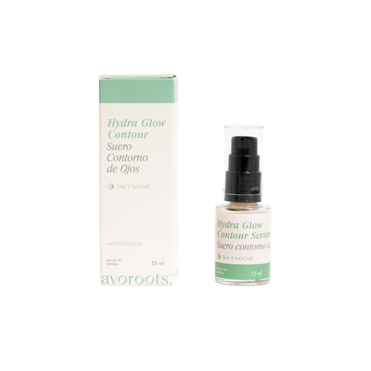 vista frontal de envase de vidrio transparente junto con empaque del suero de contorno de ojos  de avoroots en fondo blanco
