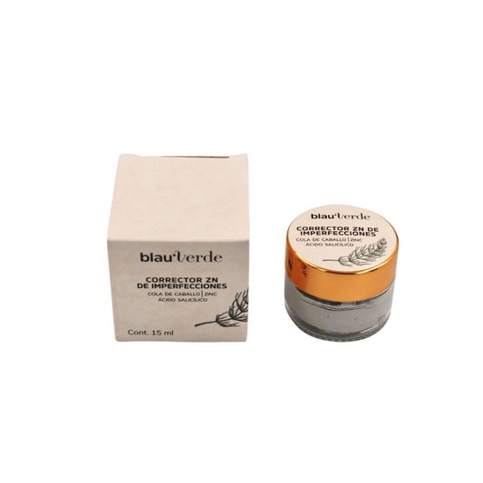 vista frontal de envase de vidrio transparente del corrector zn de imperfecciones junto con empaque de carton biodegradable blauverde