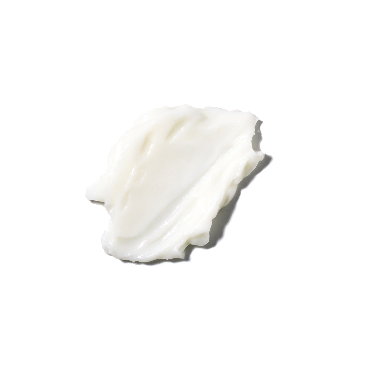 Textura cremosa de crema con arandano para ojos y labios Ere Perez en fondo blanco disponible en BLUMMA